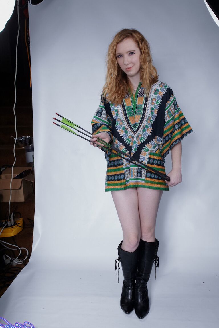 15P Natural redhead Nicki Blue pulls down her black panties during a solo shoot