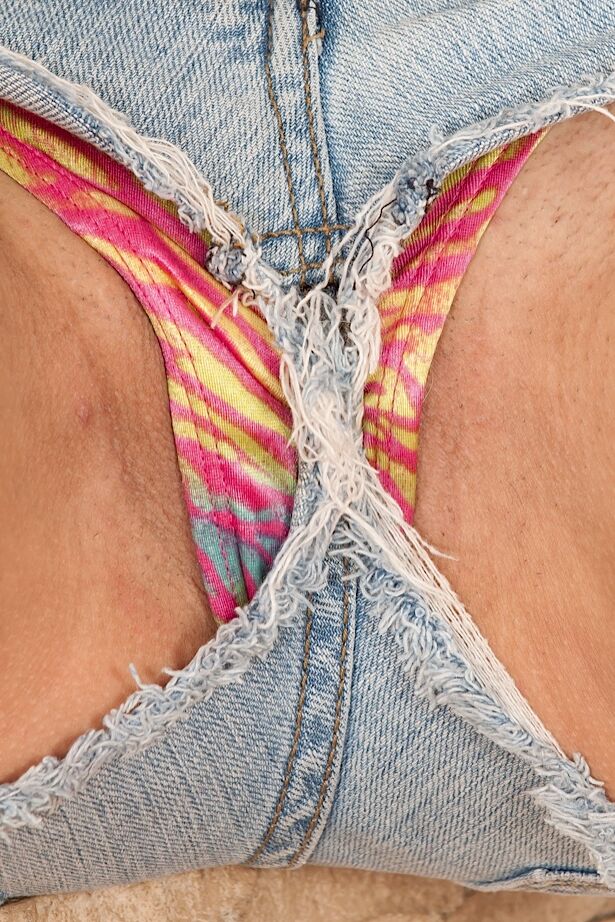 16P Frisky cutie in jeans shorts undressing and teasing her gash with her fingers