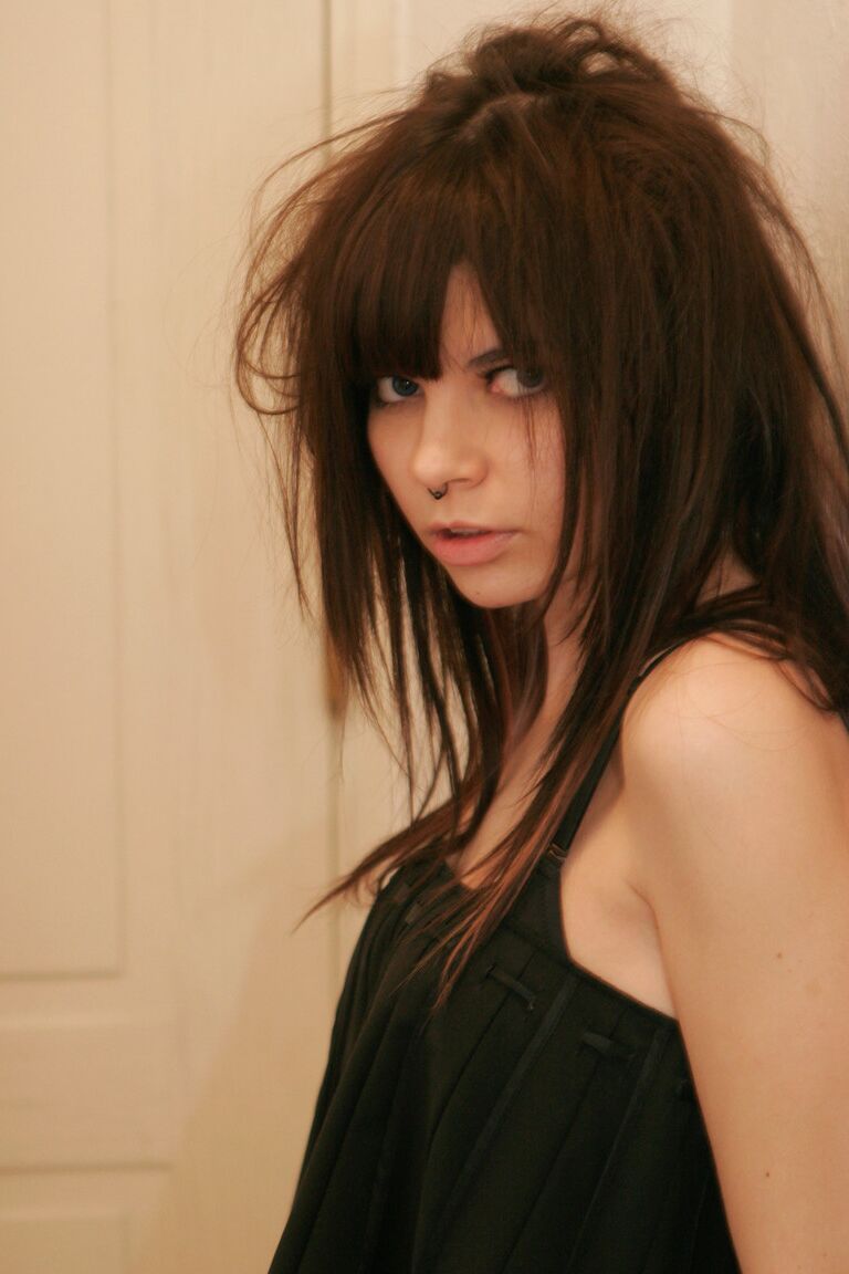 15P Petite girl Kaira 18 smokes while getting totally naked behind a closed door