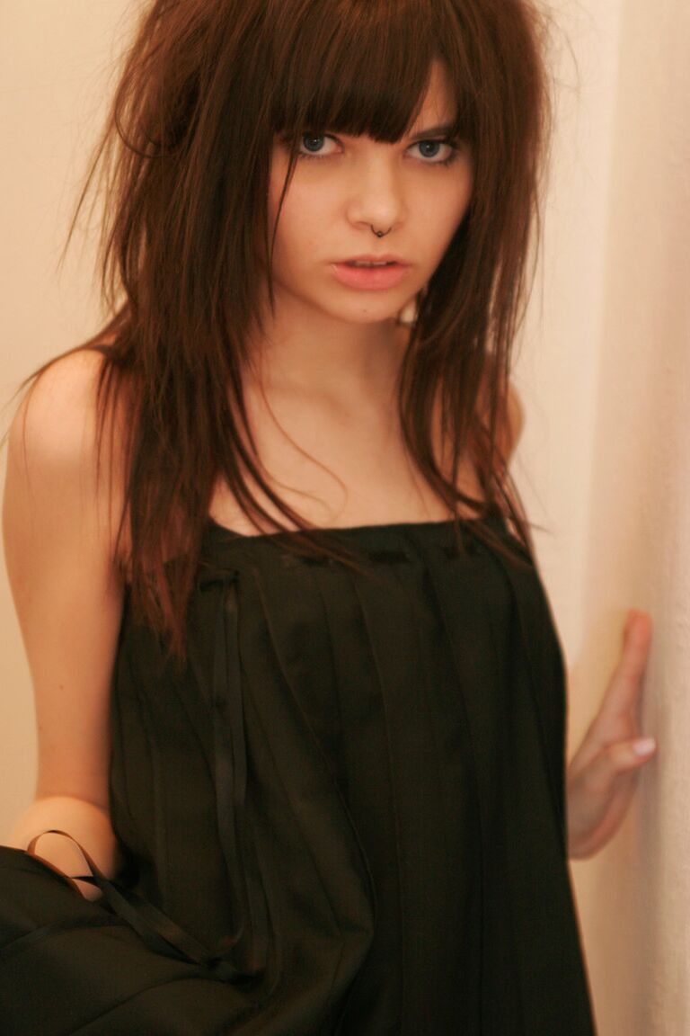 15P Petite girl Kaira 18 smokes while getting totally naked behind a closed door