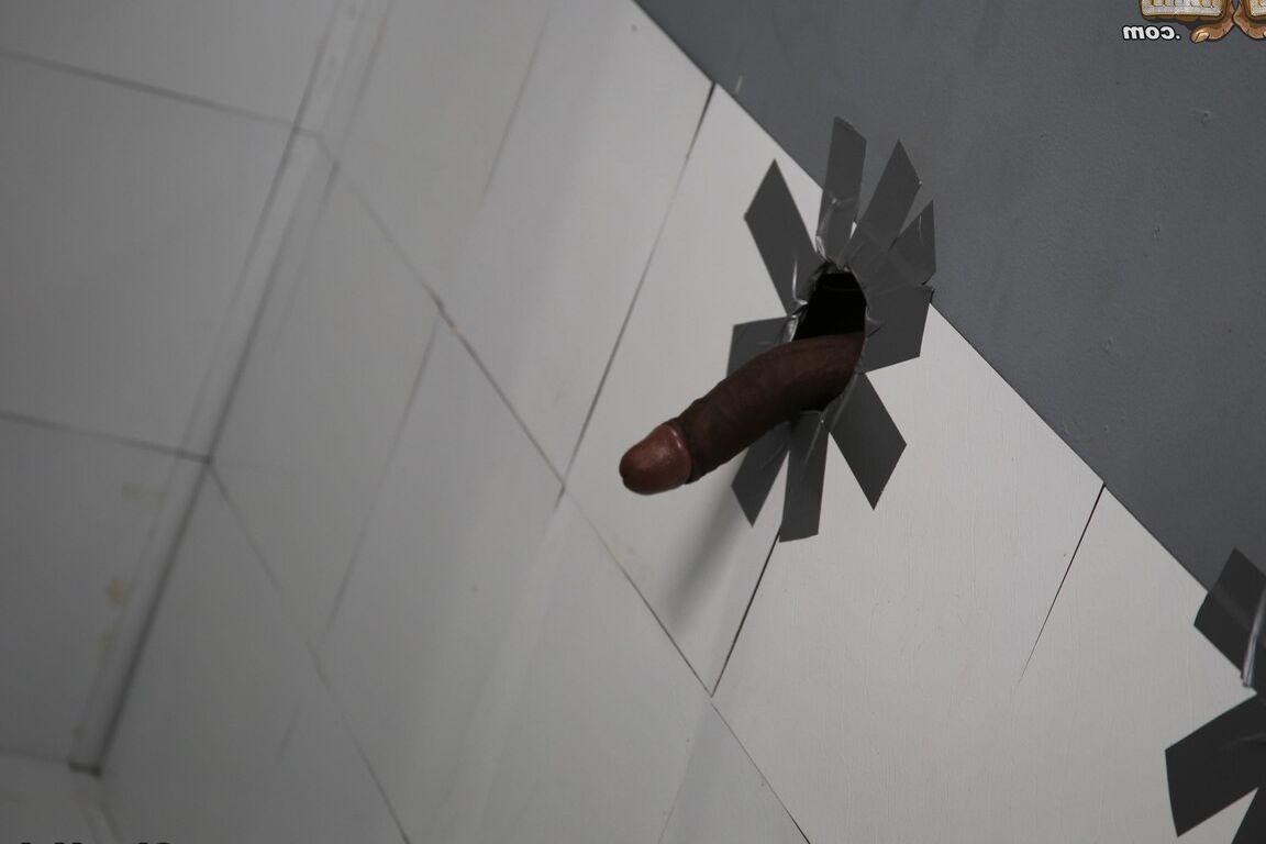 15P Blonde slut sucks off two black cocks at a gloryhole without a second thought