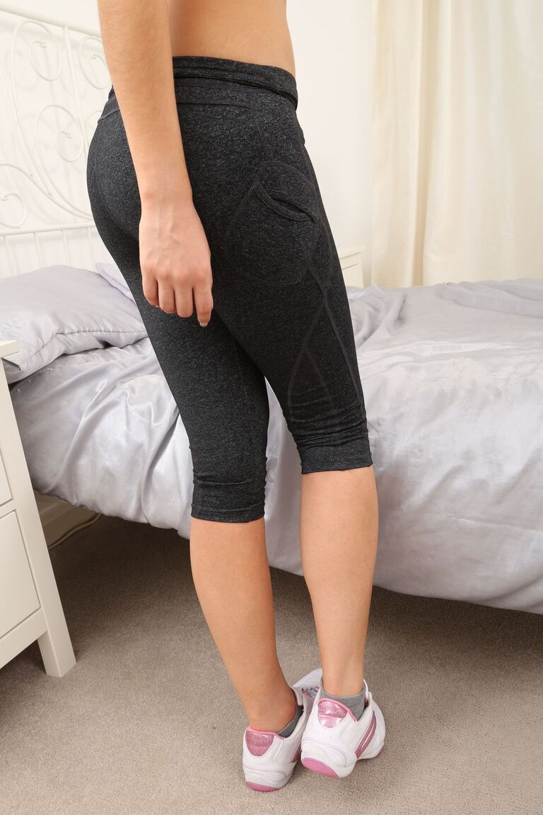 21P Delicious babe Maria Smith poses in gym leggings and socks as she goes topless