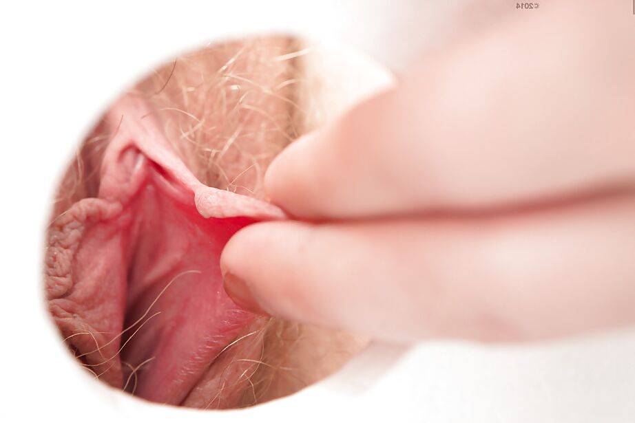 16P Girl in glasses pulls down panties for extreme close up of hairy cooter