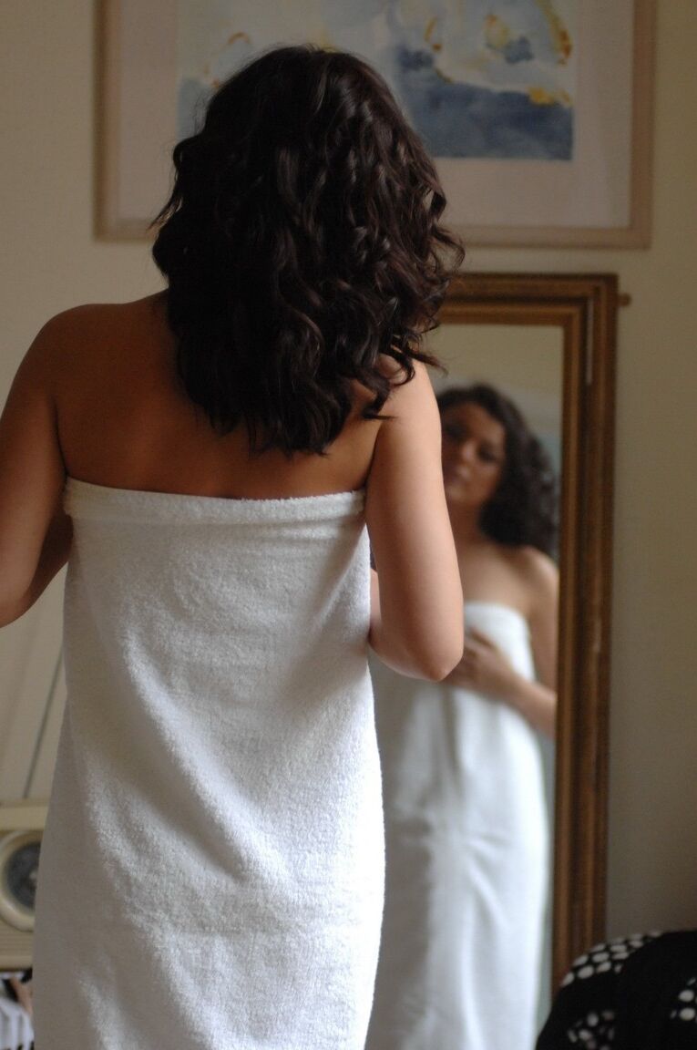 12P Sexy brunette Bryoni Kate stands naked by a window while trying on new panties