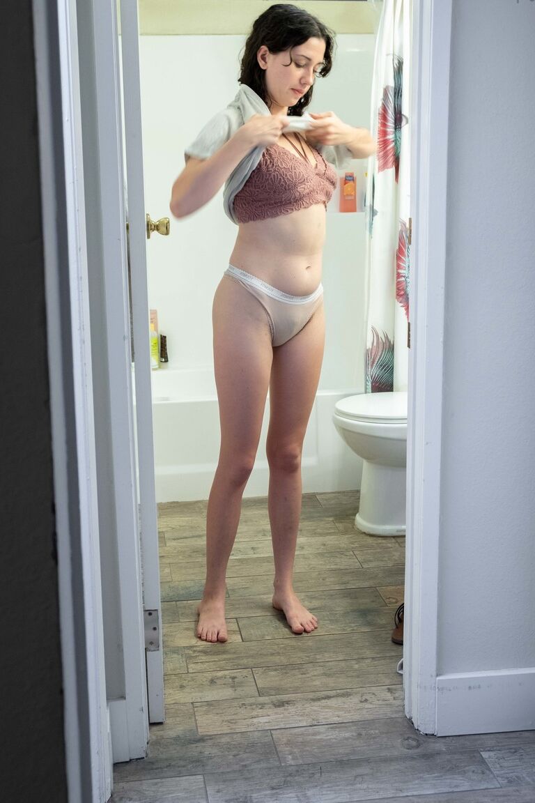 17P Naked brunette with natural bush Mary J caught getting dressed in the bathroom