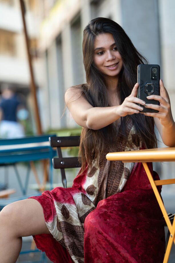 18P Gorgeous French brunette Savana takes selfies as she strolls around the