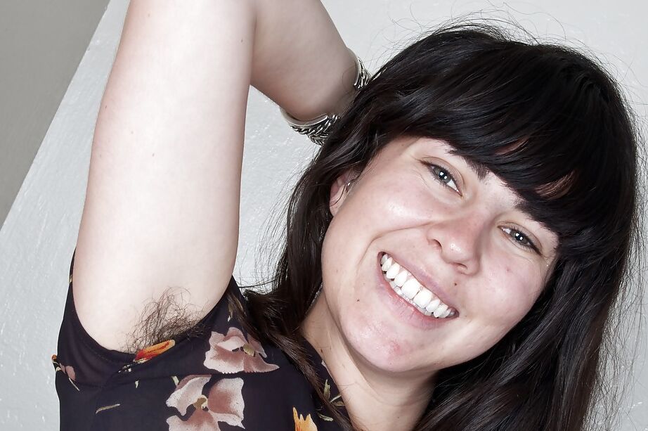 16P Brunette babe with hairy armpits and bushy cunt taking off her clothes