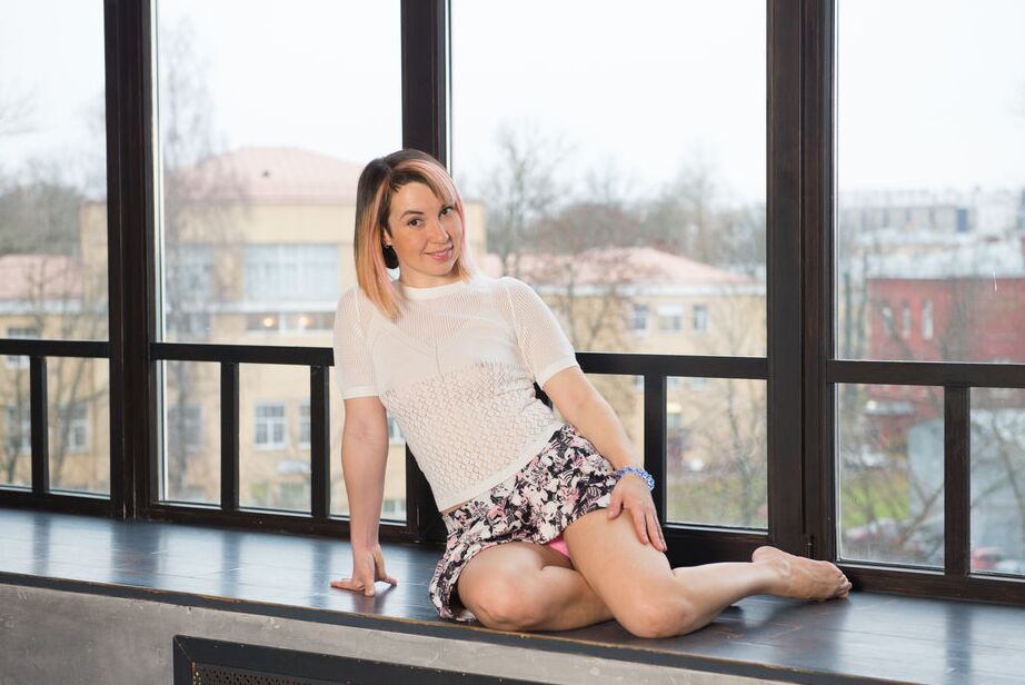 16P Teen model Leka B gets completely naked on a table top in front of a window