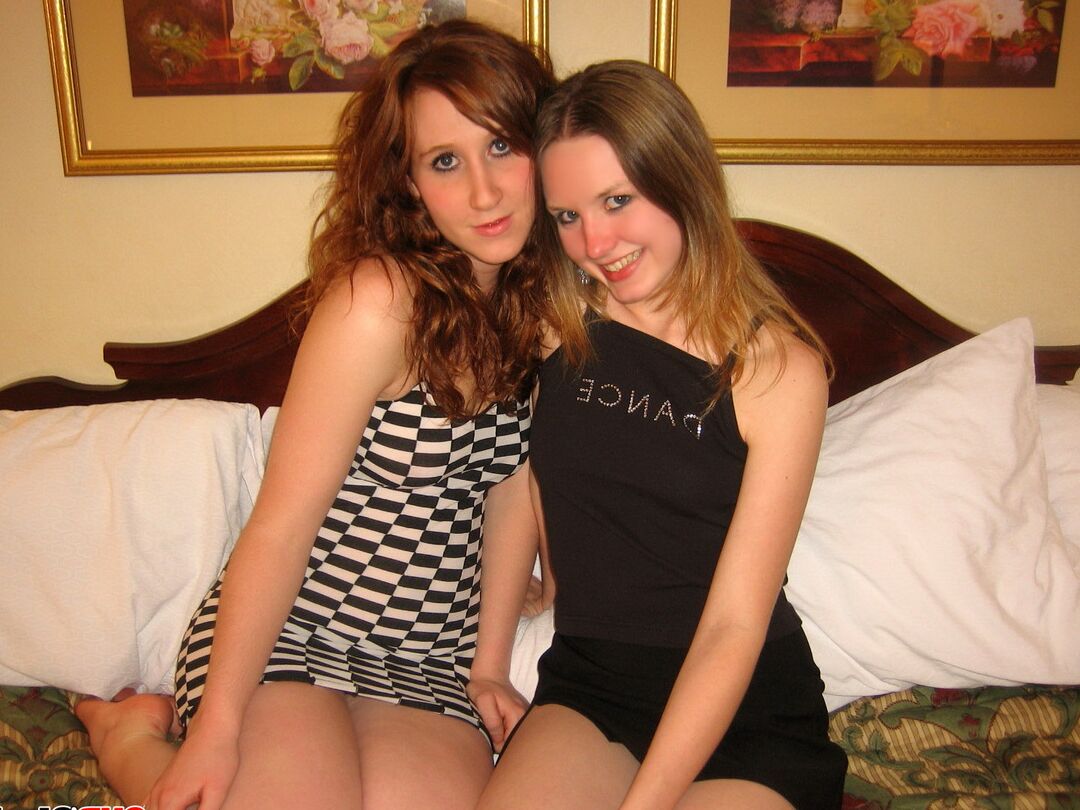 12P Horny teens Shelby and Ruby get naked in a hotel bed with each other and
