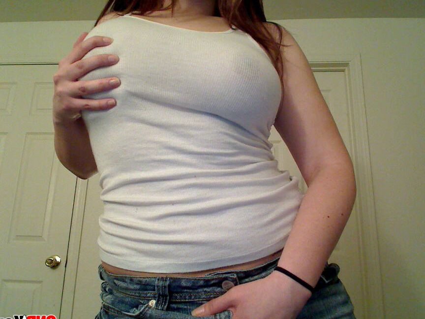 12P Kayla obviously has no bra on under her white tanktop as you can see her dark