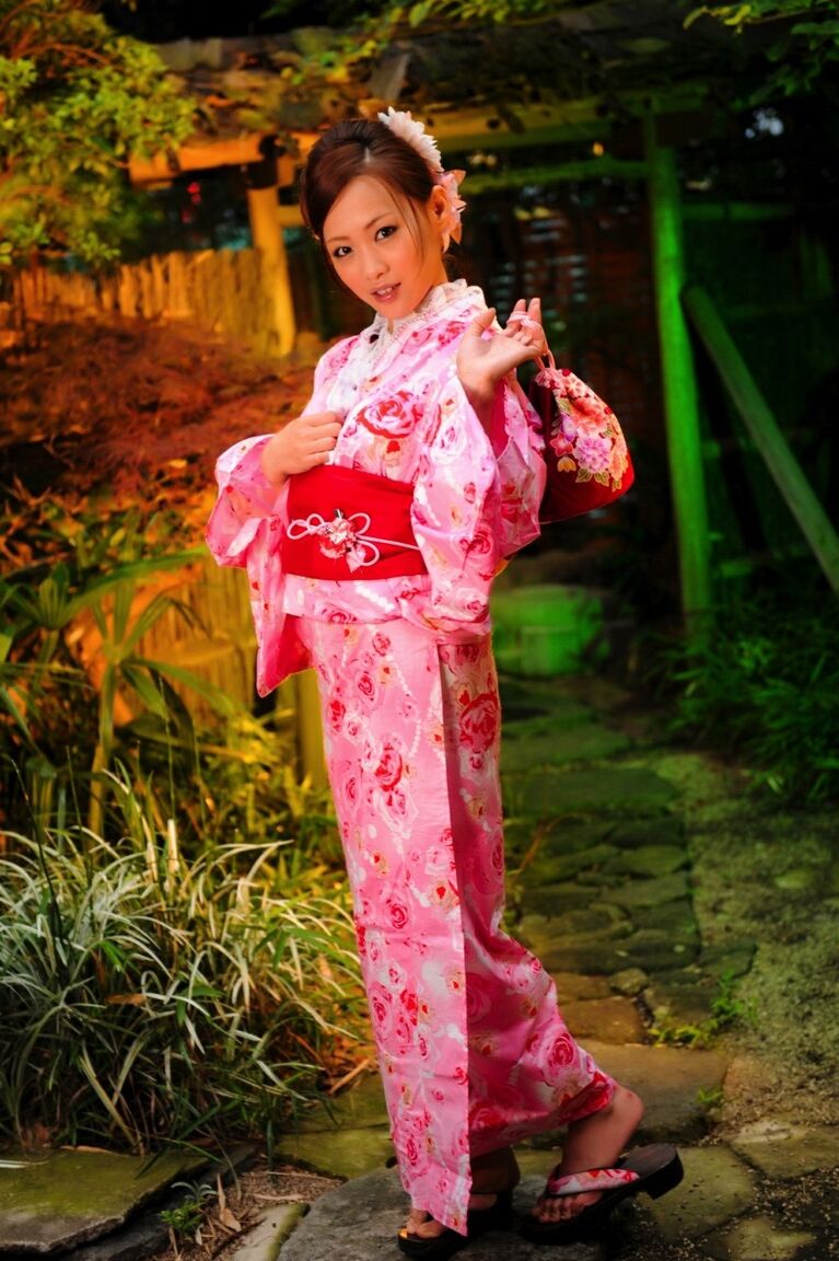 12P Japanese geisha let's a breast escape from a traditional kimono