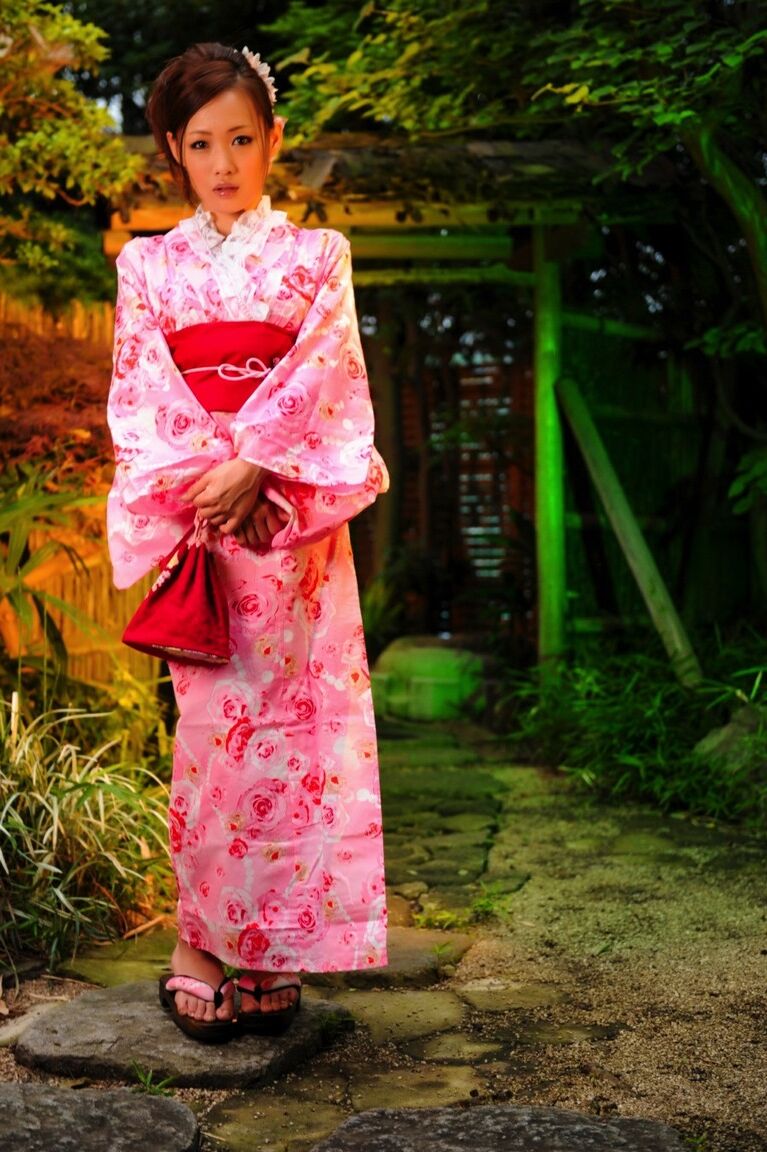 12P Japanese geisha let's a breast escape from a traditional kimono