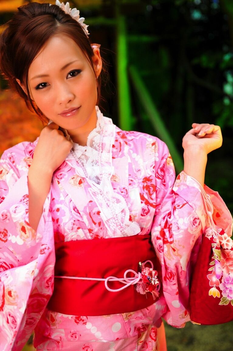 12P Japanese geisha let's a breast escape from a traditional kimono