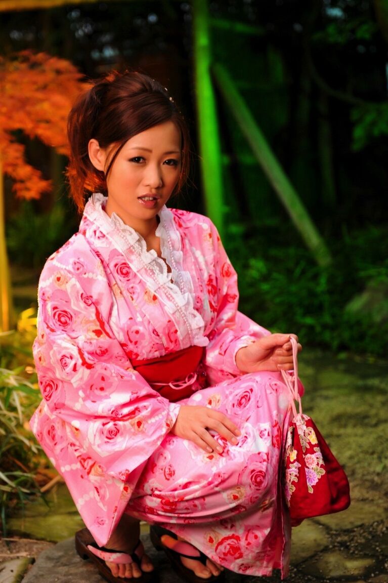 12P Japanese geisha let's a breast escape from a traditional kimono