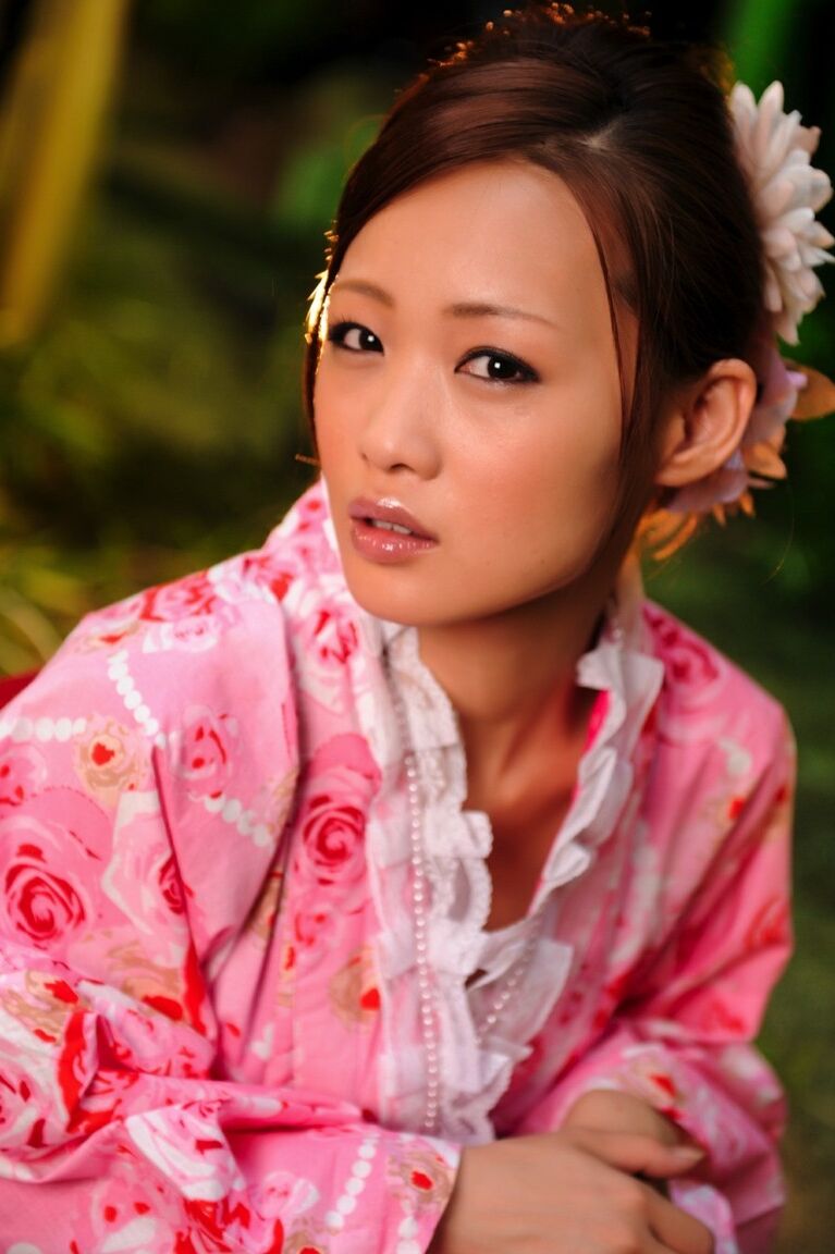 12P Japanese geisha let's a breast escape from a traditional kimono