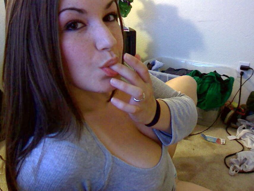 12P Teens huge double d tits are almost popping out of her tight bra