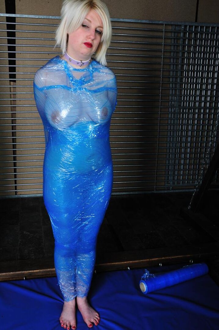 12P Naked blonde finds herself encased in saran wrap and duct tape