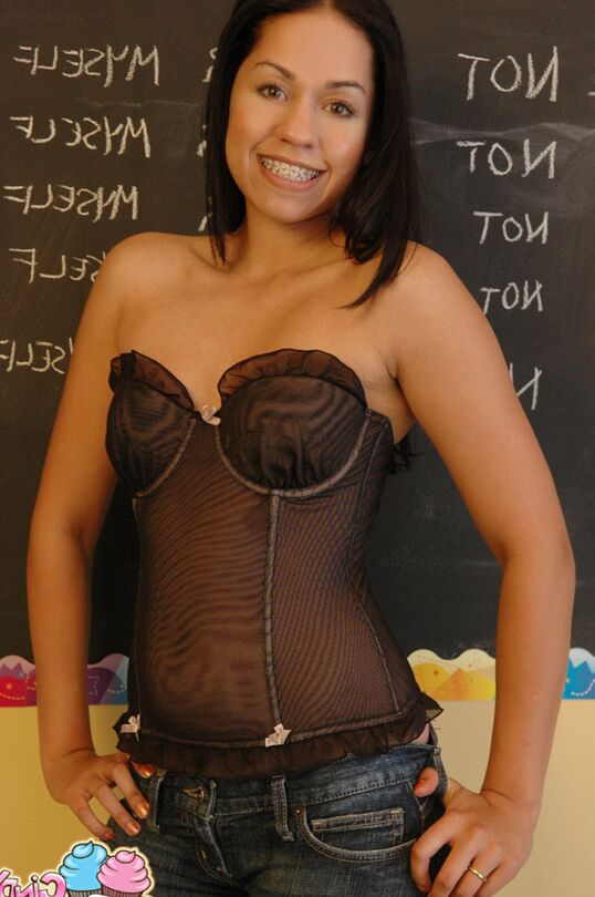 12P Latina teen Cindy Cupcakes exposes her tight ass in front of a chalkboard