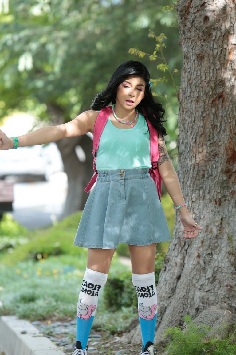 19P Petite Latina Sadie Pop strips her short skirt and shows her tiny shaved cunt