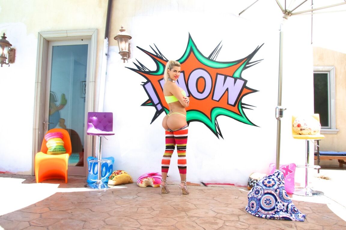15P Latina chick Savana Styles exposes her phat ass while undressing on patio
