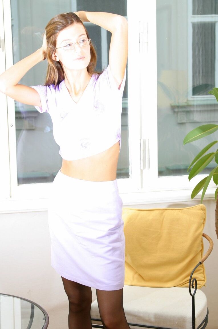 21P Brunette geek Olivia shows her slender body and tiny tits wearing lingerie