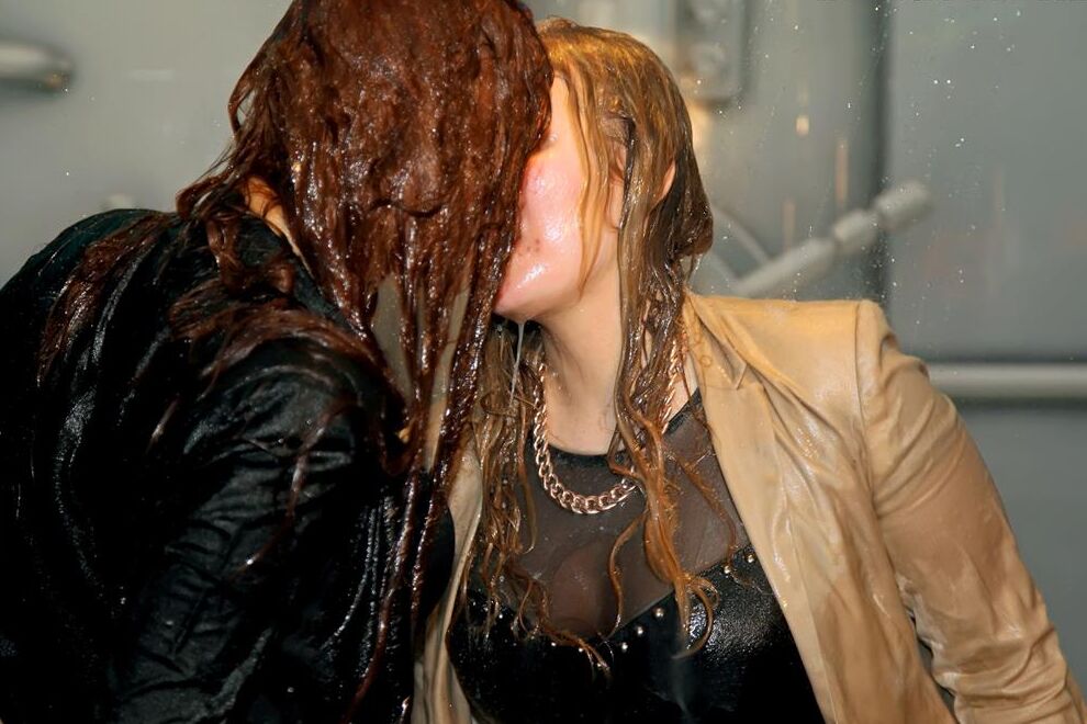 15P Dancing girls share a lesbian kiss while getting soaking wet in their clothes