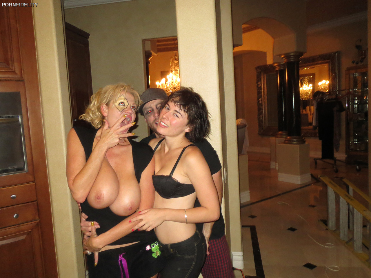 17P Stunning harlequin cabaret cutie CoCo shows off her natural tits with Kelly