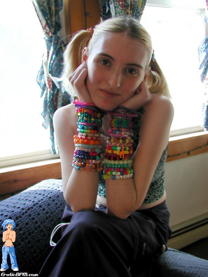 15P Young blonde Cricket gets naked on a sofa in pigtails and bangles