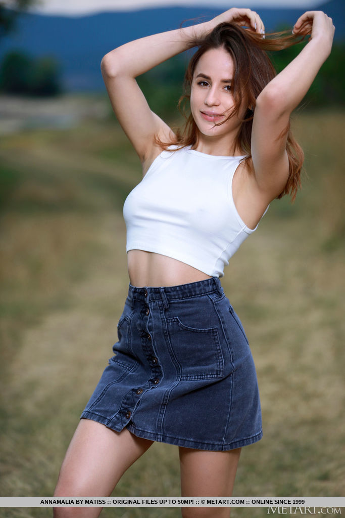 18P Nice teen Annamalia grabs her phat ass while naked on a path in a field