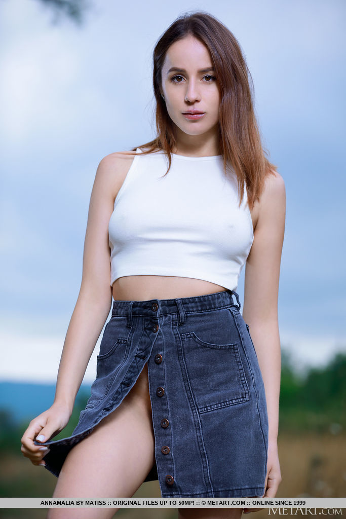 18P Nice teen Annamalia grabs her phat ass while naked on a path in a field