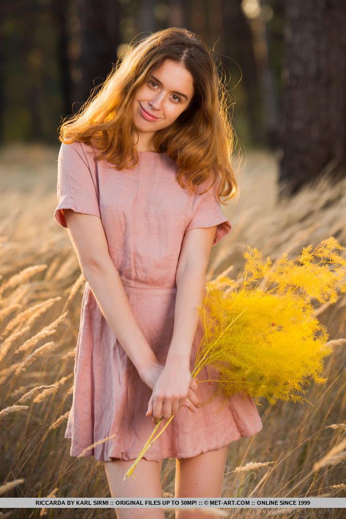 18P Teen girl next door type Riccarda displays her tight slit while naked in field