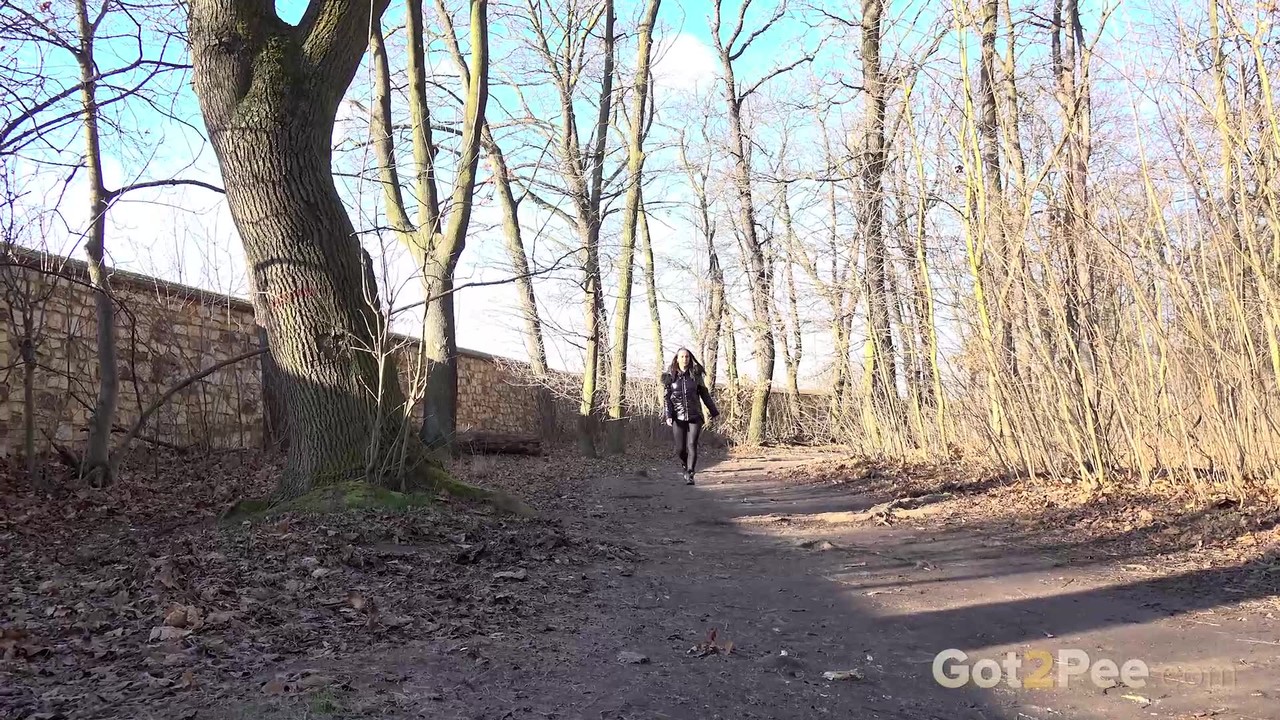 15P Naomi Benet squats in the woodland to piss