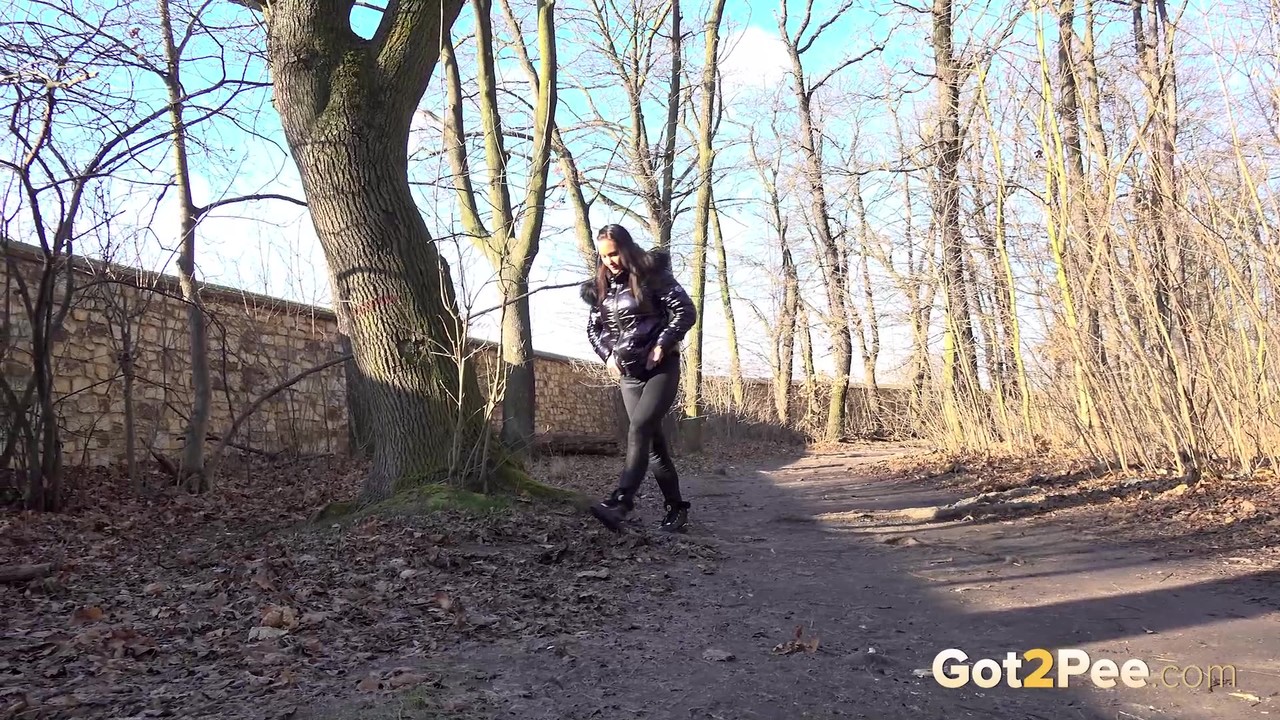 15P Naomi Benet squats in the woodland to piss