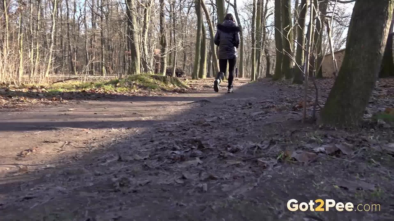 15P Naomi Benet squats in the woodland to piss
