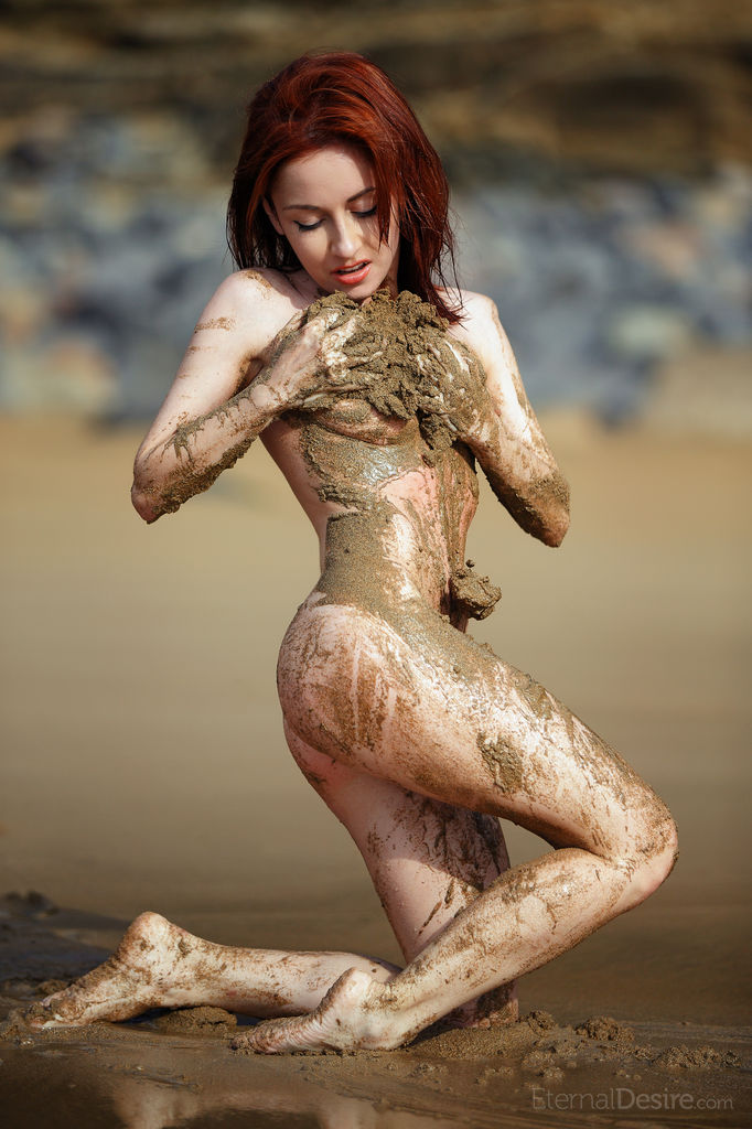16P Redheaded teen Night A frolics on a mudflat while totally naked
