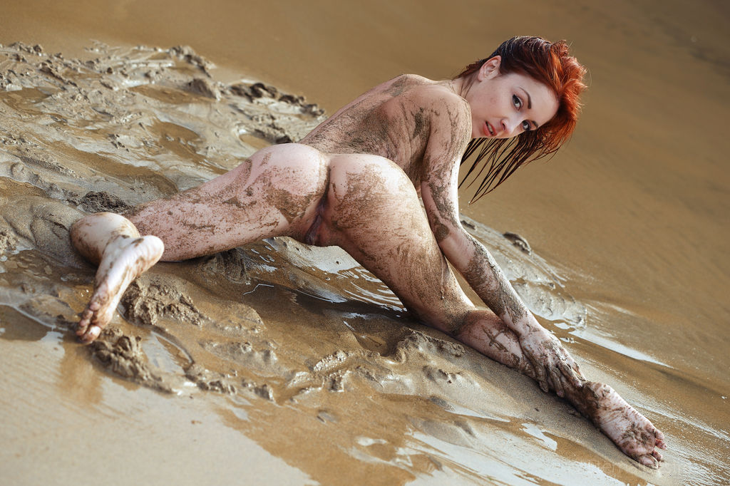 16P Redheaded teen Night A frolics on a mudflat while totally naked