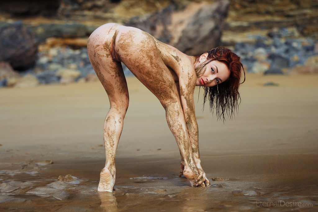 16P Redheaded teen Night A frolics on a mudflat while totally naked