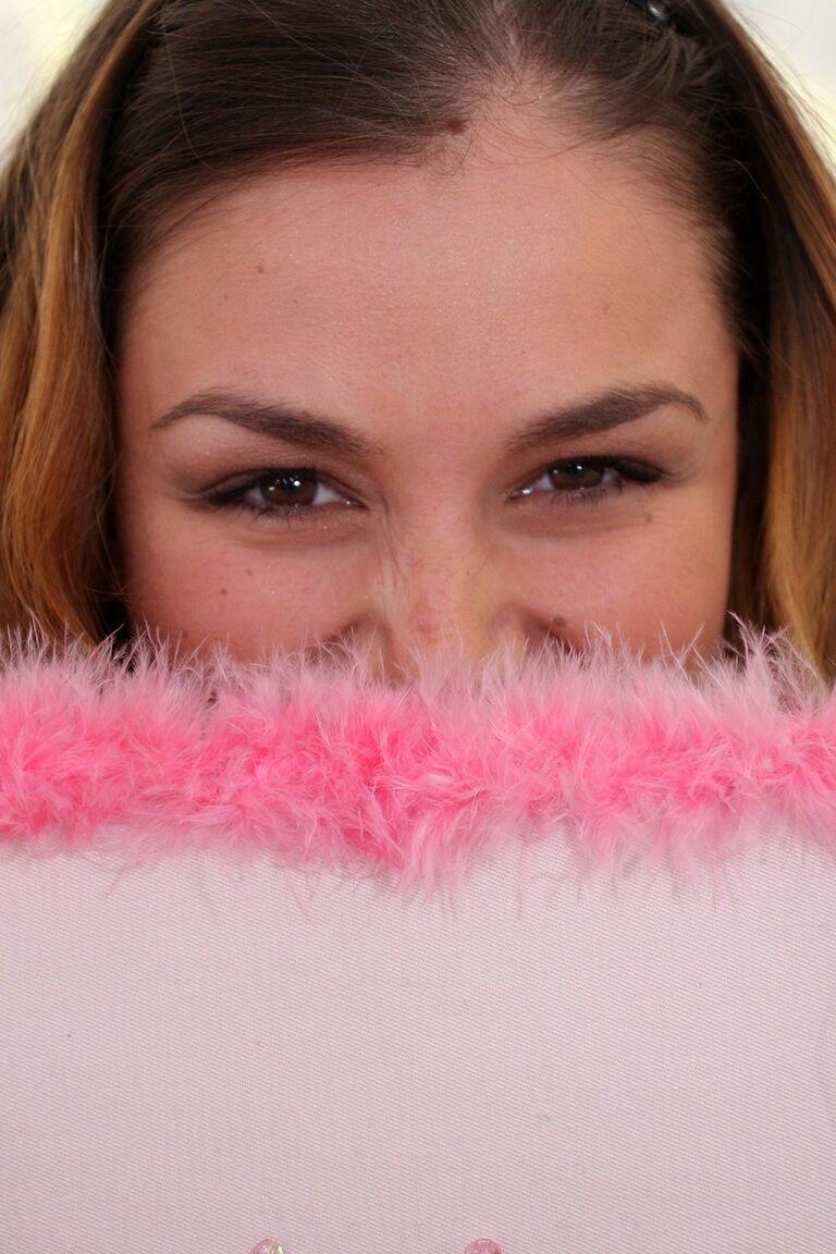 21P Brunette with a small ass Allie Haze shows her titties and gets a facial