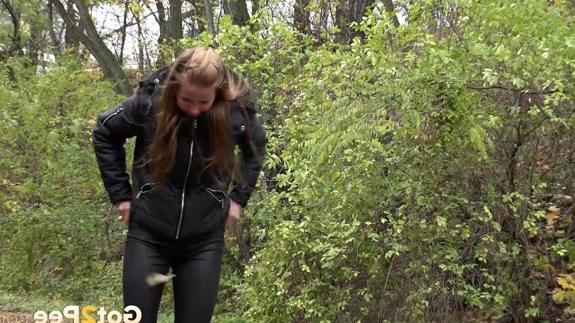 15P Cute shy girl pisses all over the path outside