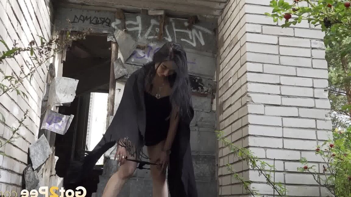 15P Raven haired goth squats to pee outside