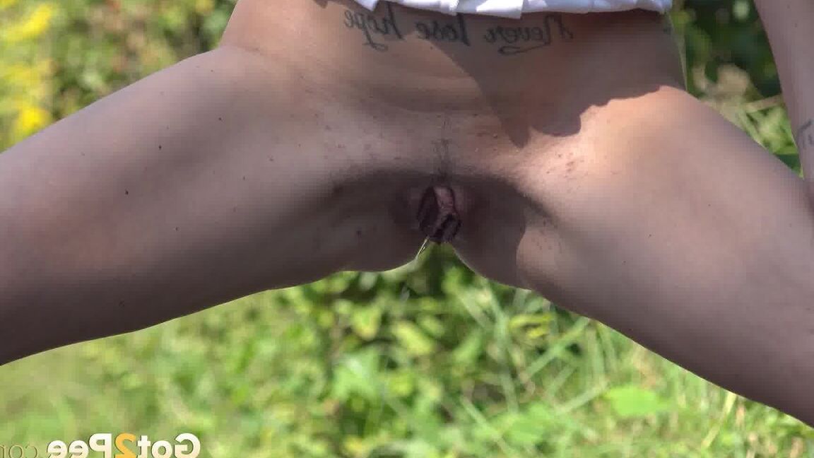 15P Ali Bordeaux stands and pees on a road