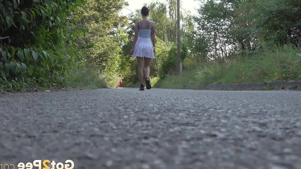15P Ali Bordeaux stands and pees on a road