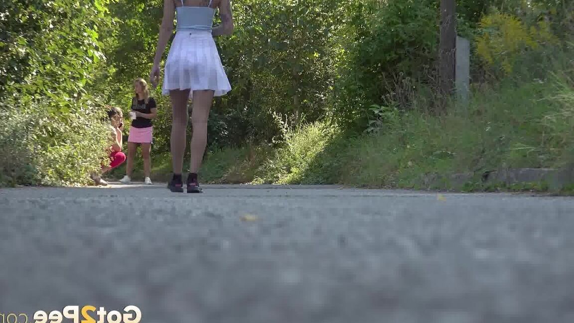 15P Ali Bordeaux stands and pees on a road