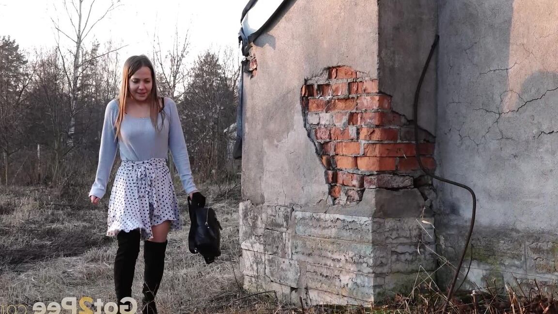 15P Sweet brunette squats and pees on the ground