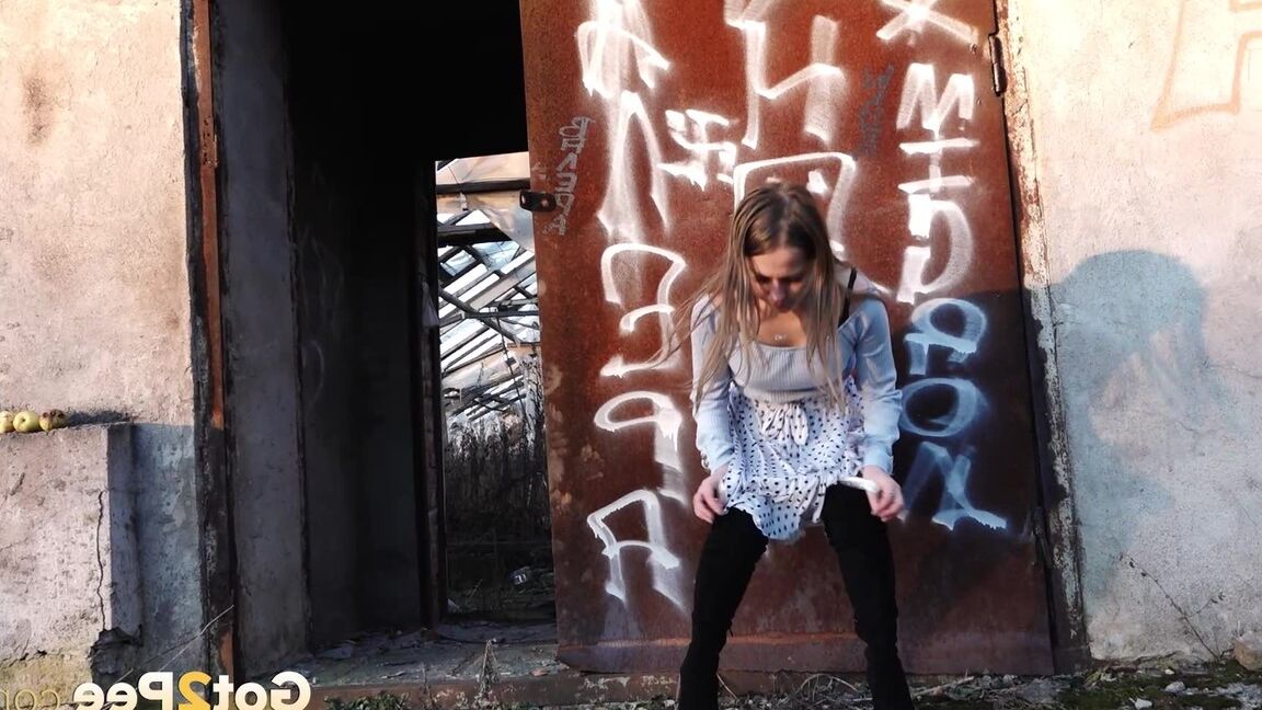 15P Sweet brunette squats and pees on the ground