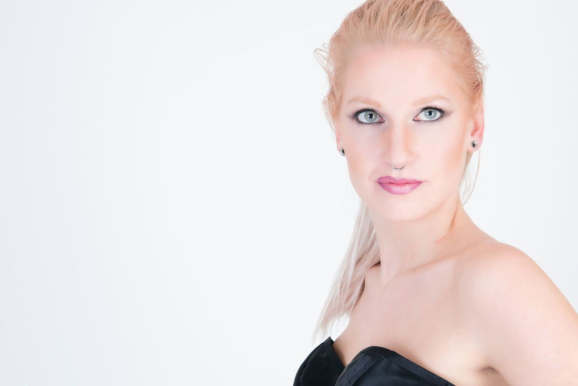 16P Fair-skinned blonde is fitted with a gag while wearing a hobble dress
