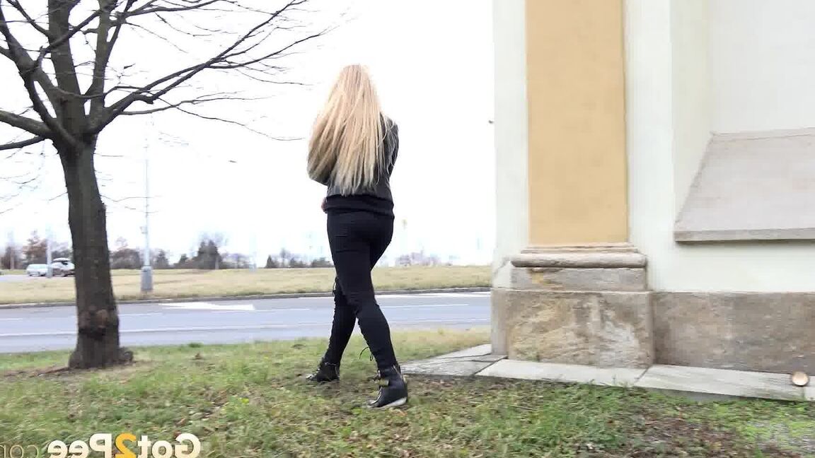 15P Cute blonde squats outside in the wind to piss
