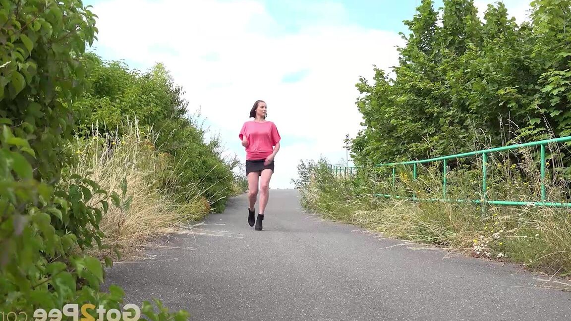 15P Gorgeous brunette Victoria Daniels squats to pee