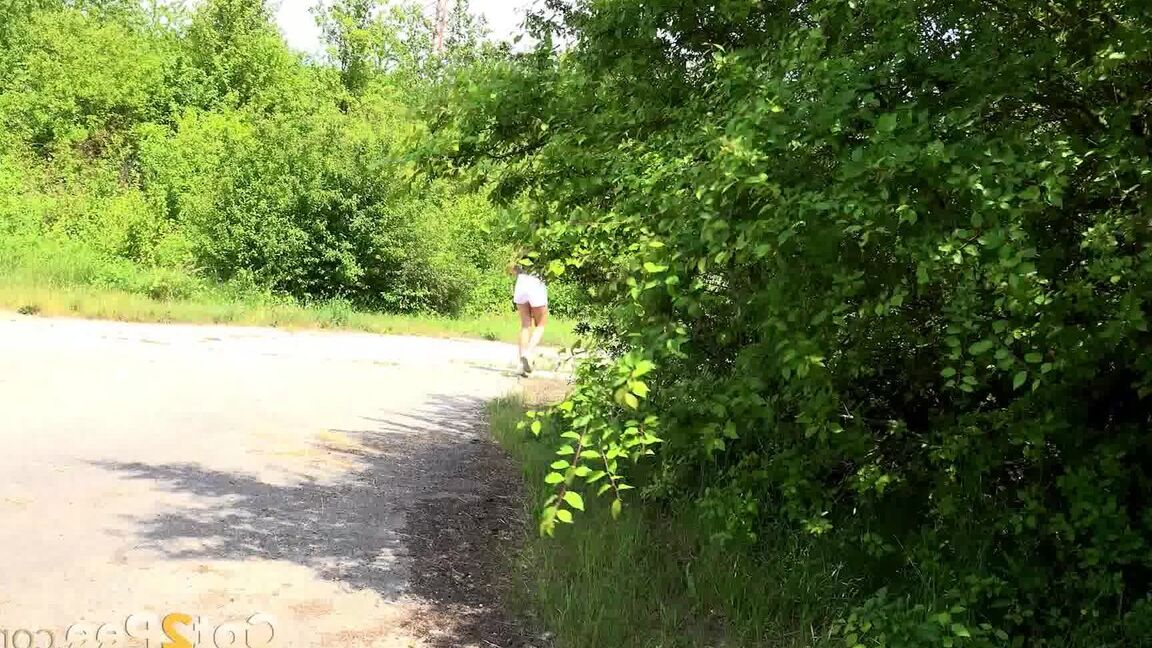 15P Dark haired Esperansa squats in a field to pee