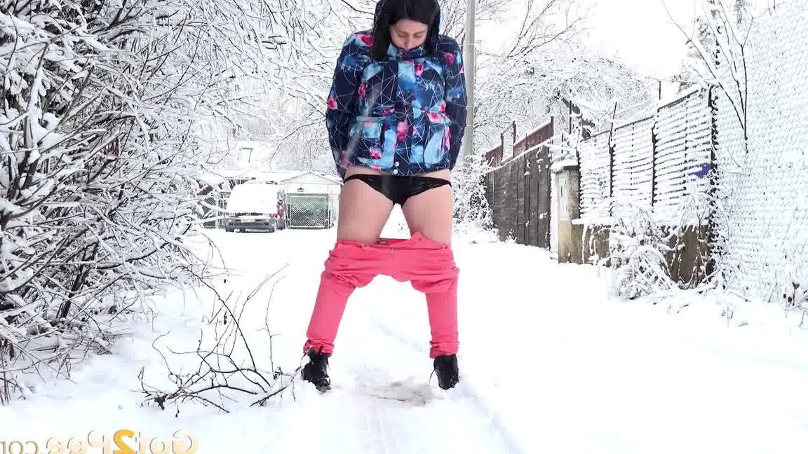 15P Gorgeous European babe squats to pee in the snow